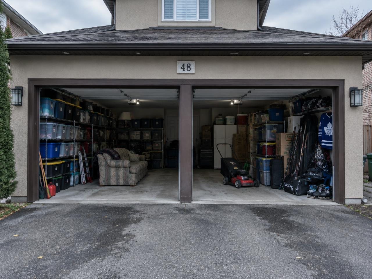 Packed double garage in Leaside, Toronto, before Space Back cleanout